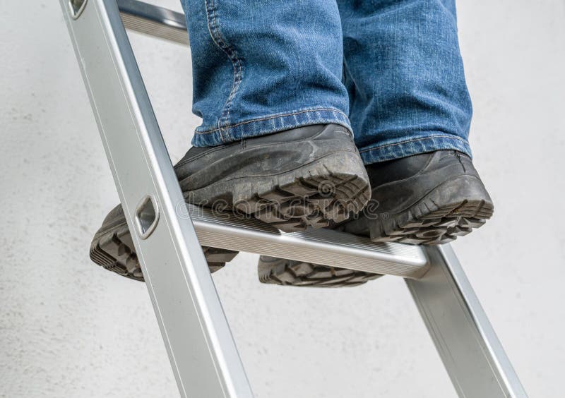 Mensentribunes op een ladder stock foto Mensentribunes op een ladder stock foto