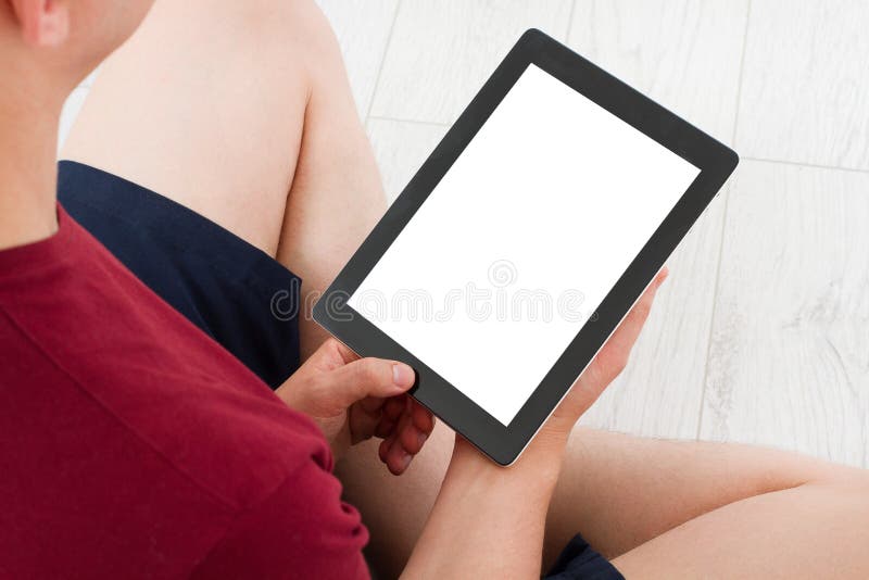 Mensenzitting met tablet in handen Hoogste mening Spot omhoog De ruimte van het exemplaar malplaatje spatie stock foto's Mensenzitting met tablet in handen Hoogste mening Spot omhoog De ruimte van het exemplaar malplaatje spatie stock foto's