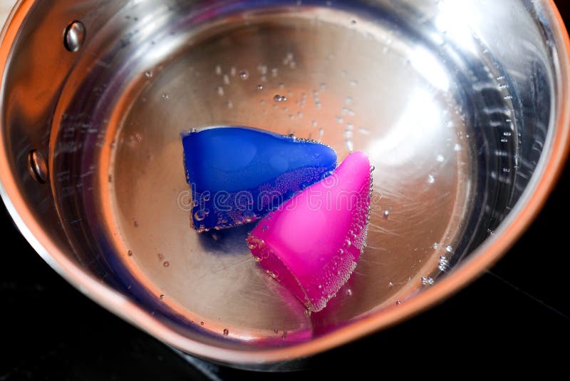 Menstrual Cup in Hot Water. Boil before First Use Stock Image Image