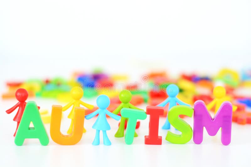 Mental health disorder, autism word with colored toys figurine on white background royalty free stock image Mental health disorder, autism word with colored toys figurine on white background royalty free stock image