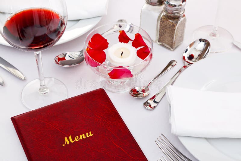 Still life photo of a menu on a restaurant table. Still life photo of a menu on a restaurant table.