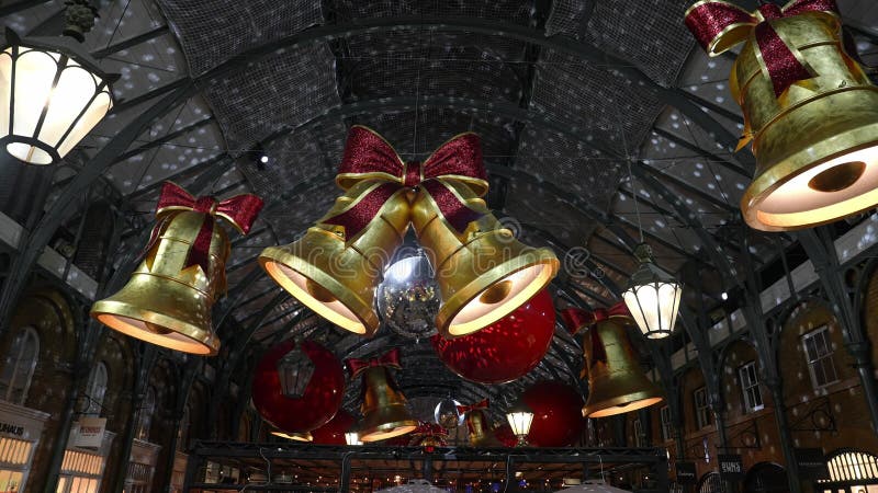 Mercado popular de maçã decorado para natal em londres.