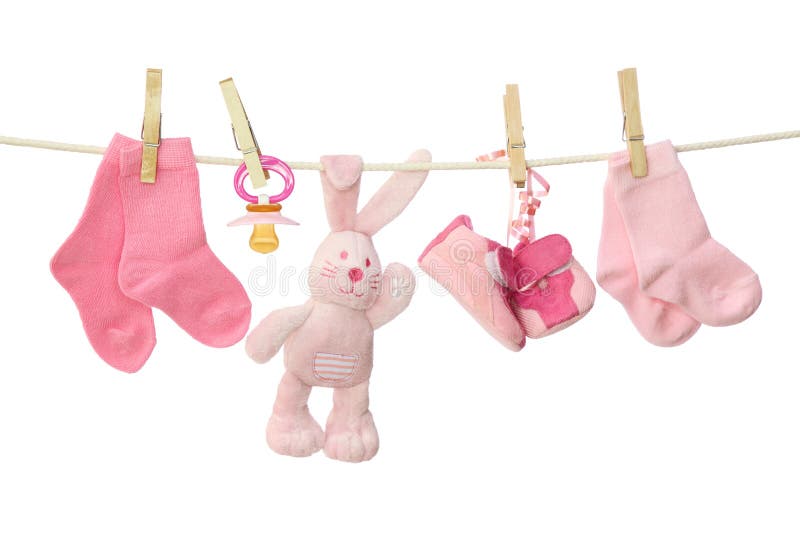 Artículos para bebé en rosa imagen de archivo