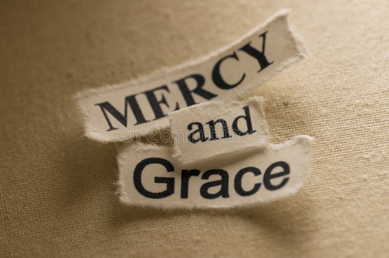 Picture of religious concept with words mercy and grace. Picture of religious concept with words mercy and grace.