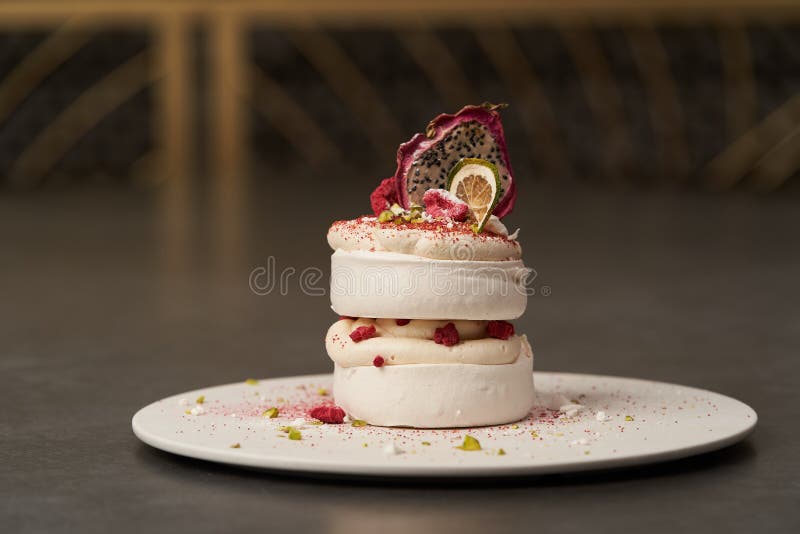 Meringue Dessert Pavlova Cake with Fresh Raspberries and Whipped Cream ...