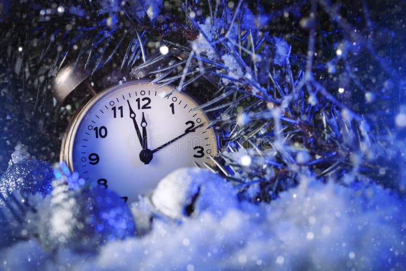 Merry Christmas and happy New year. Clock indicating the outgoing year. Horizontal. Christmas background. royalty free stock photo Merry Christmas and happy New year. Clock indicating the outgoing year. Horizontal. Christmas background. royalty free stock photo
