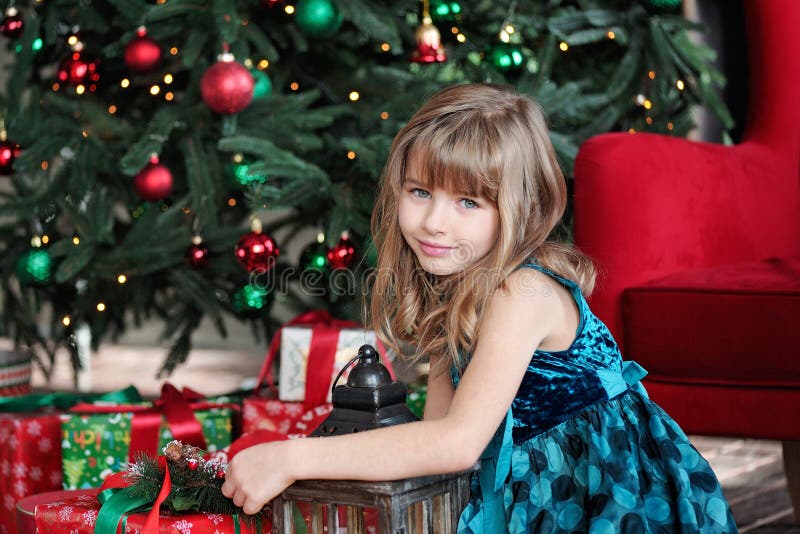 Merry Christmas. Pretty Young Girl Near Christmas Tree Stock Photo ...