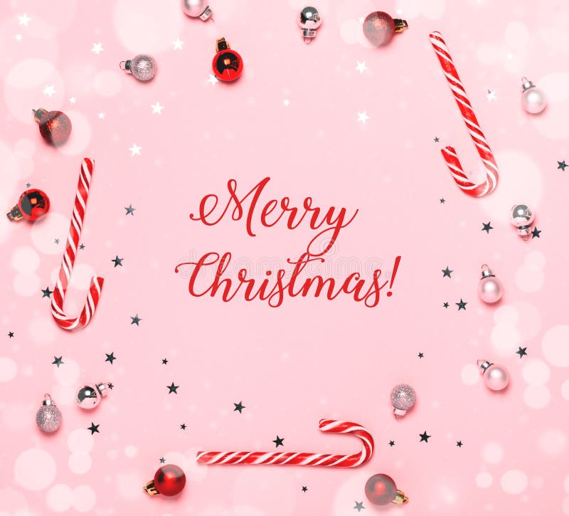 Merry Christmas Text on Pink Background with Christmas Decorations ...