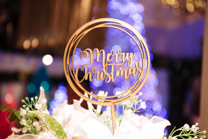 Merry Christmas text sign topper stick on the top of bouquets wi stock images