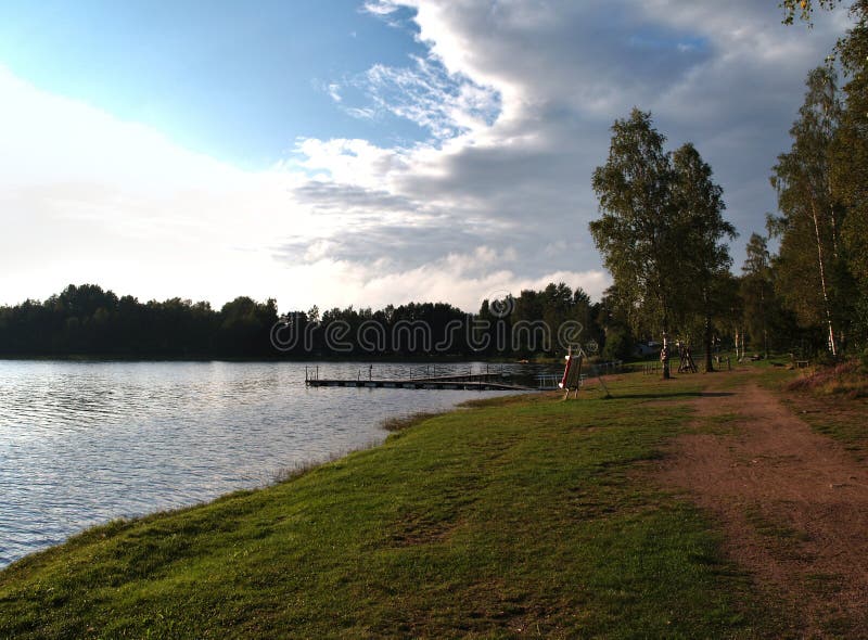 Mesmerizing scenery of a calm lake in Sweden stock photos