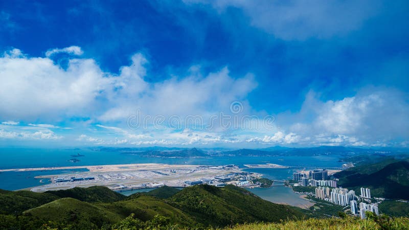 Mesmerizing scenery of mountains with blue sky in the background stock image