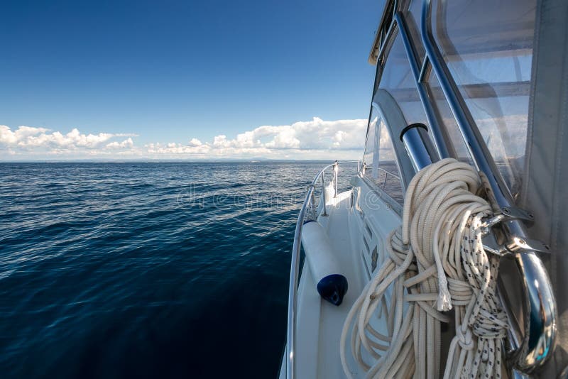 Mesmerizing scenery of the seascape with a ship on the foreground royalty free stock images
