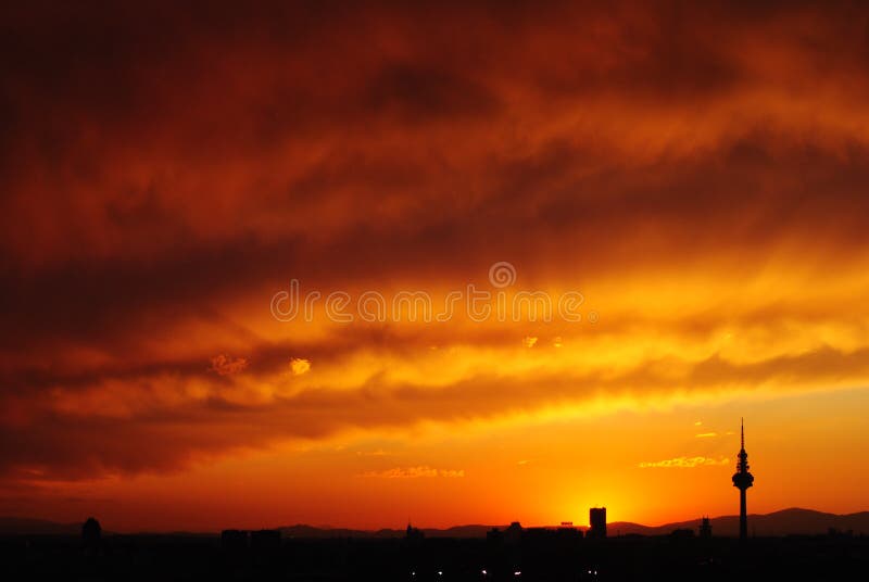 Mesmerizing view of the beautiful orange cloudy sky during sunset royalty free stock photo