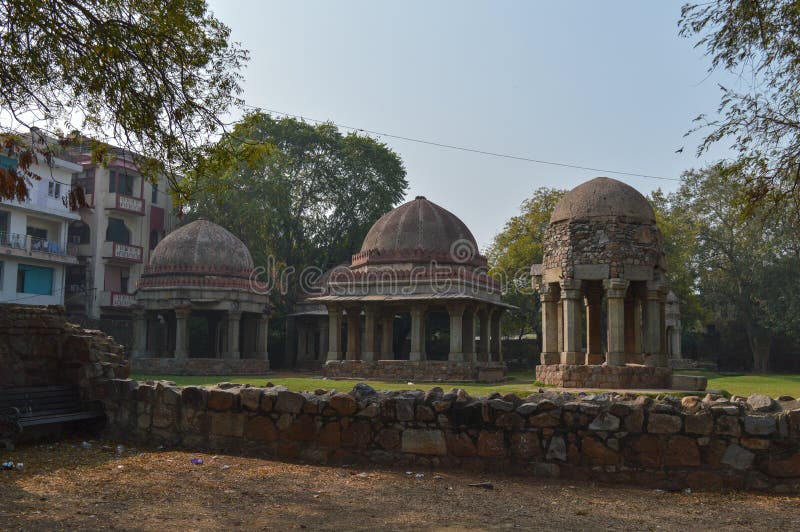 A mesmerizing view of hauz khas lake and garden from the hauz khas fort at hauz khas village at winter foggy morning