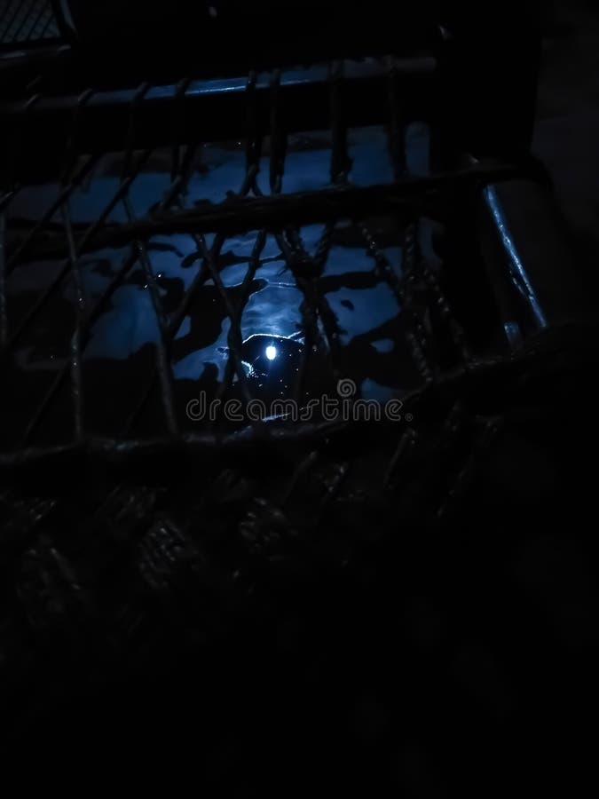A mesmerizing view of moon reflection clicked over cots stock photo