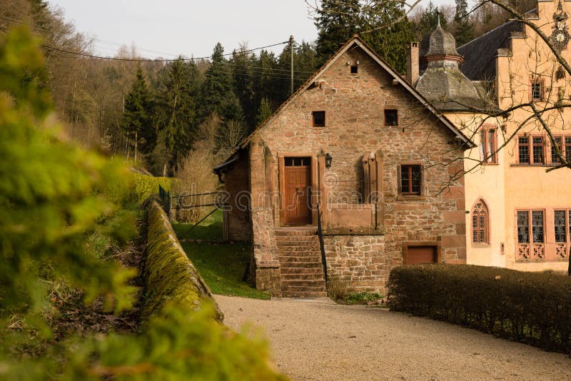 An outbuilding of the castle of Mespelbrunn in the evening sun