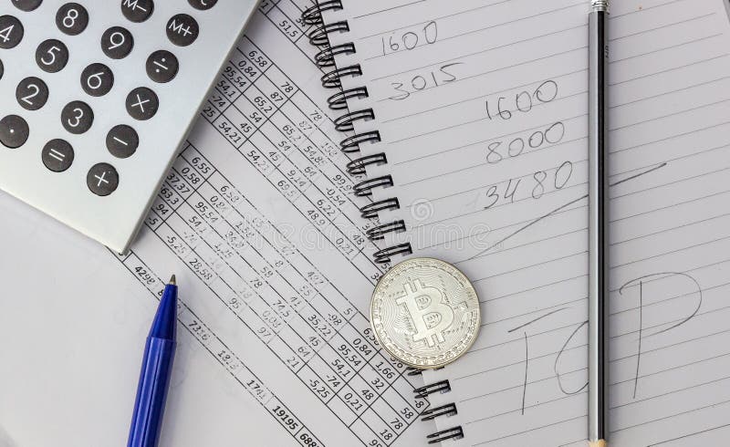 Mess on your desktop. Calculator, notebook, documents, Bitcoin royalty free stock photography Mess on your desktop. Calculator, notebook, documents, Bitcoin royalty free stock photography