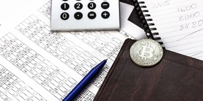 Mess on your desktop. Calculator, notebook, documents, Bitcoin, office supplies stock image Mess on your desktop. Calculator, notebook, documents, Bitcoin, office supplies stock image