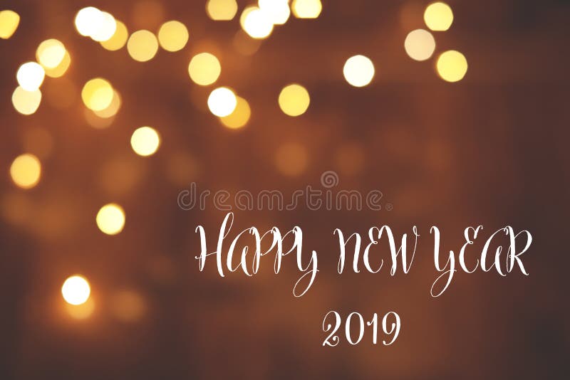Message HAPPY NEW YEAR 2019 and bokeh effect on background, space for text. stock photos Message HAPPY NEW YEAR 2019 and bokeh effect on background, space for text. stock photos