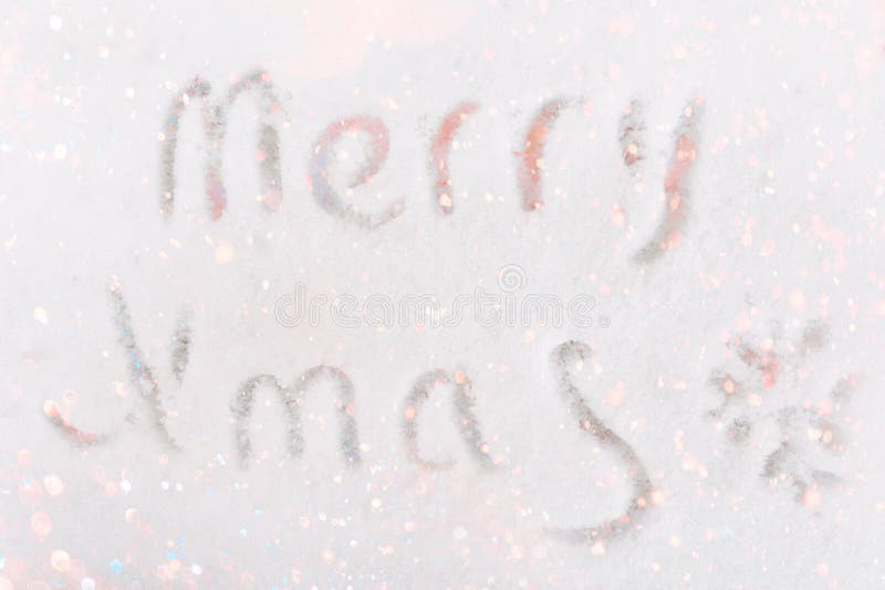 Messaggio di Buon Natale scritto mano sul piccolo scarabocchio del fiocco di neve del fondo bianco della neve Struttura di scinti immagini stock libere da diritti Messaggio di Buon Natale scritto mano sul piccolo scarabocchio del fiocco di neve del fondo bianco della neve Struttura di scinti immagini stock libere da diritti