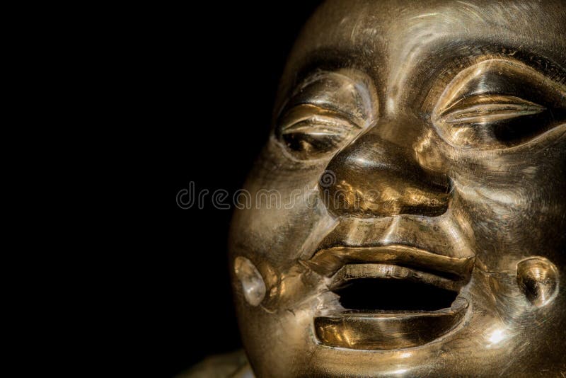 Messing Boedha Gelukkig het lachen monniksgezicht in close-up royalty-vrije stock fotografie Messing Boedha Gelukkig het lachen monniksgezicht in close-up royalty-vrije stock fotografie