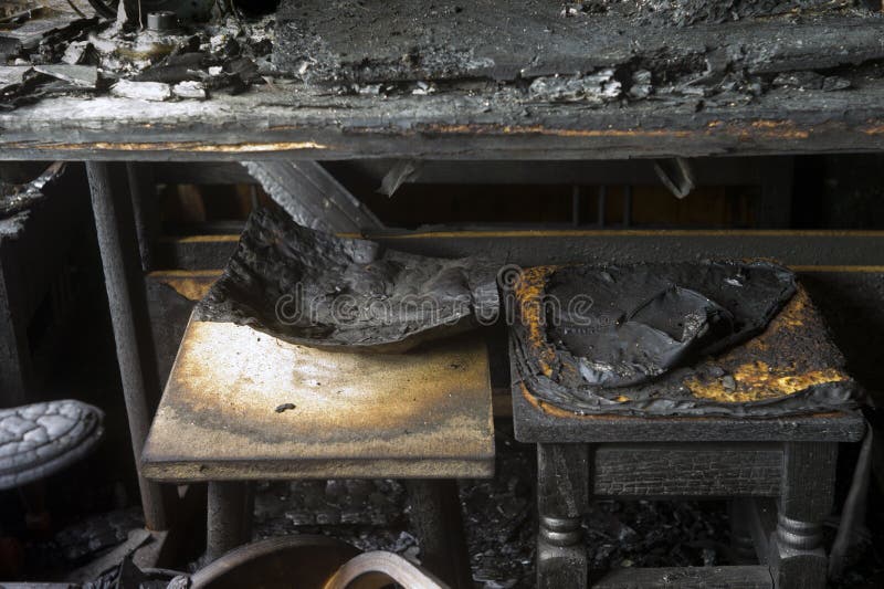 Burnt furniture after fire stock photo. Image of chair 184767050