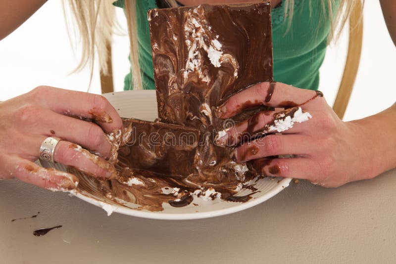 Messy chocolate and hands