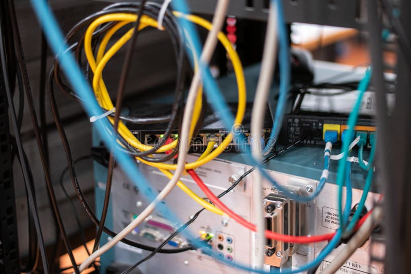 Messy Connection Computer and LAN Cables Power Cord Plugs. Close Up