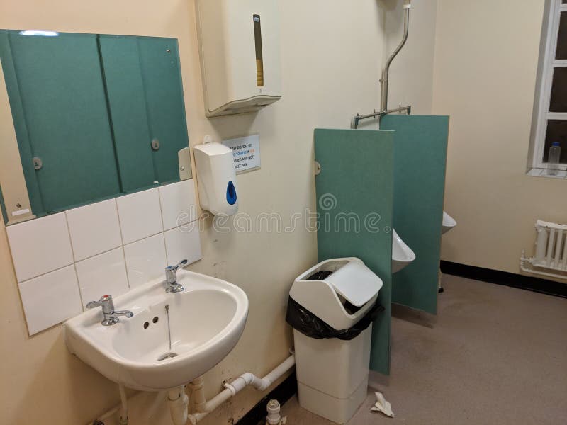 Messy toilet mens room stock photography Messy toilet mens room stock photography
