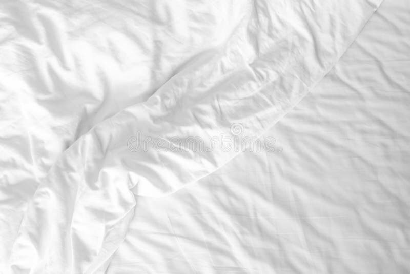Messy white bed sheets stock photo. Image of clean, satin - 128732736