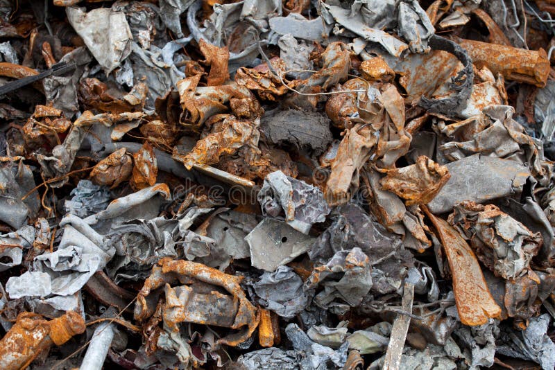 Close up of metal pieces magnetically separated from shredded cars. Close up of metal pieces magnetically separated from shredded cars.