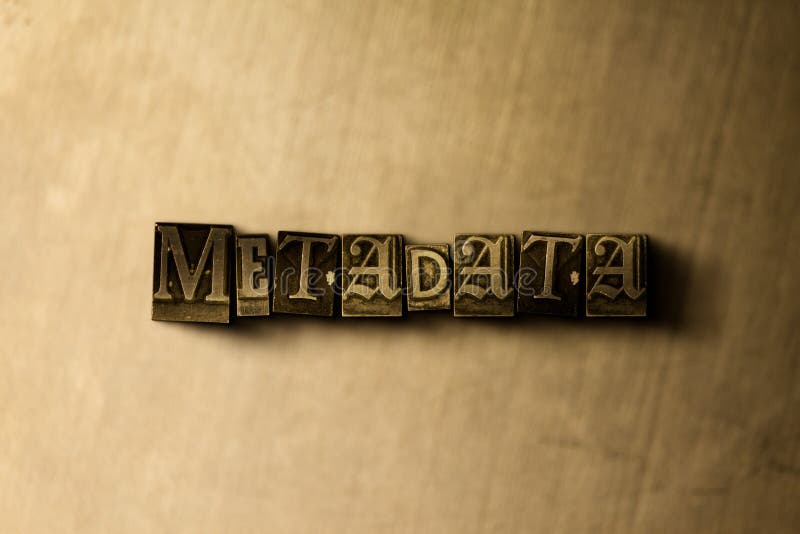 METADATEN - Nahaufnahme des grungy Weinlese gesetzten Wortes auf Metallhintergrund lizenzfreies stockbild METADATEN - Nahaufnahme des grungy Weinlese gesetzten Wortes auf Metallhintergrund lizenzfreies stockbild