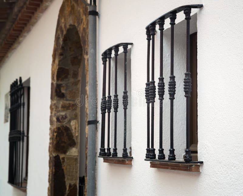 Metal bars on the windows stock image. Image of facade 57813563