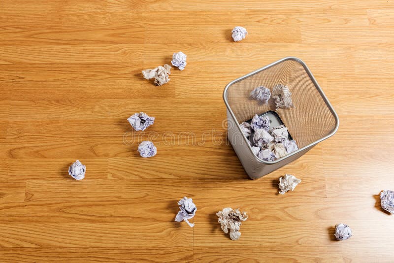 Metal basket and paper ball royalty free stock images Metal basket and paper ball royalty free stock images