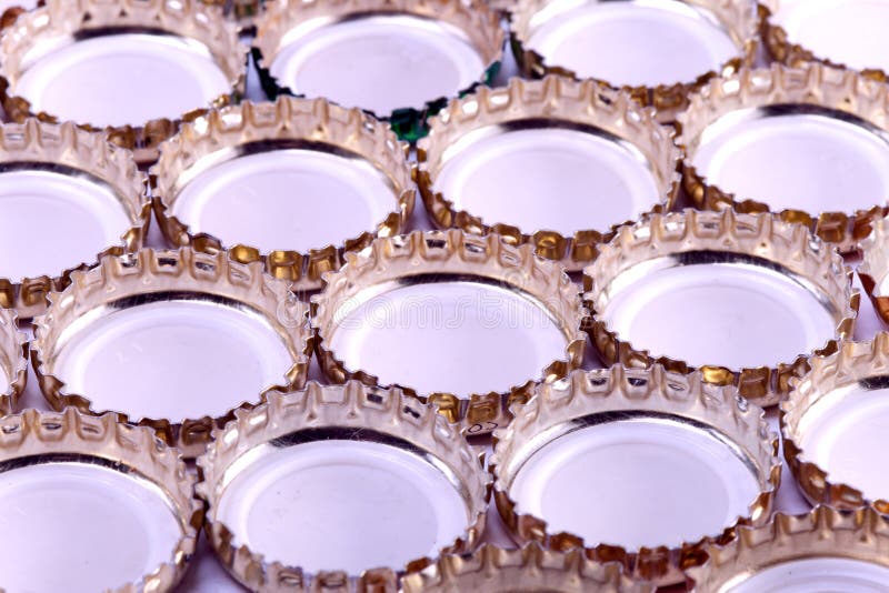 Metal Beer Bottle Caps.abstract Background on a White Background Stock