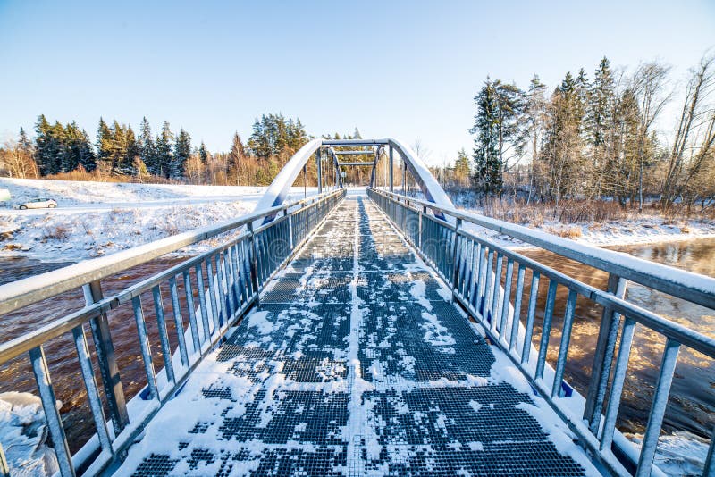 metal bridge over the river in country