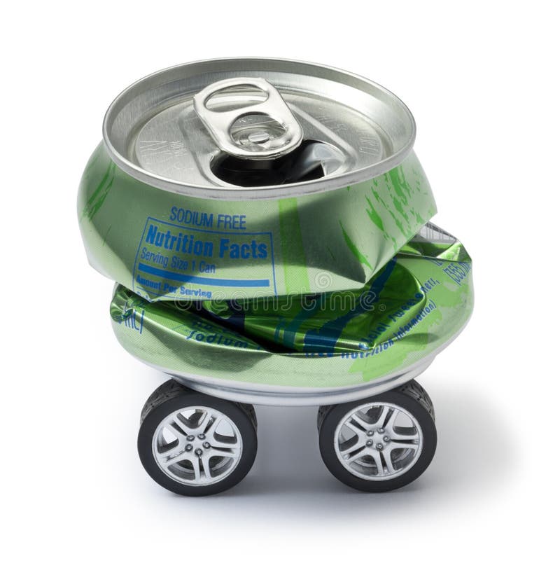 A crushed aluminium can with car wheels on a white background. A crushed aluminium can with car wheels on a white background