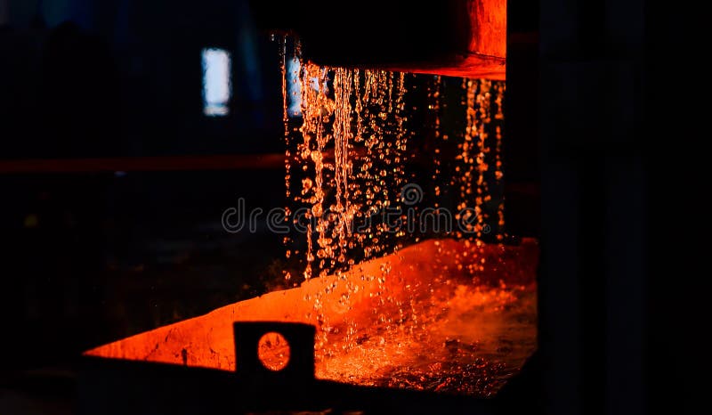 Metal on casting. Metallurgy. Steelmaking plant and steelmaking workshop stock image Metal on casting. Metallurgy. Steelmaking plant and steelmaking workshop stock image