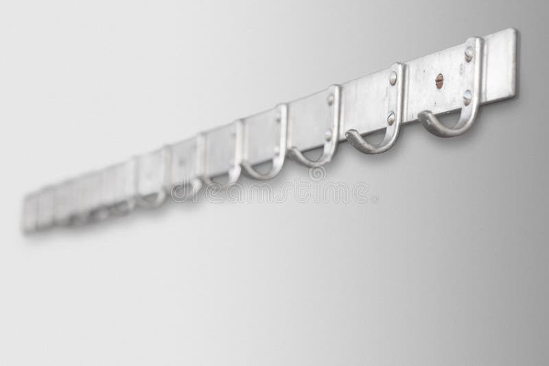 Coat hanger on gray wall stock photo. Image of rack 157046562