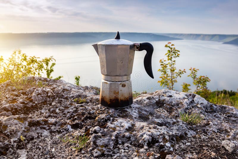 Process of making camping coffee outdoor with metal geyser coffee maker on  a gas burner, step by step. Travel activity for relaxing, bushcraft, advent  Stock Photo - Alamy