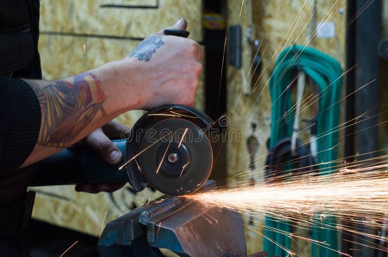 Metal cutting by grinder stock photo. Image of machine 150230742