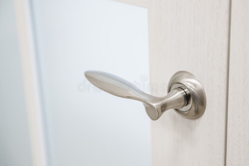 Metal Doors Knob Handle with Lock on Modern Interior Stock