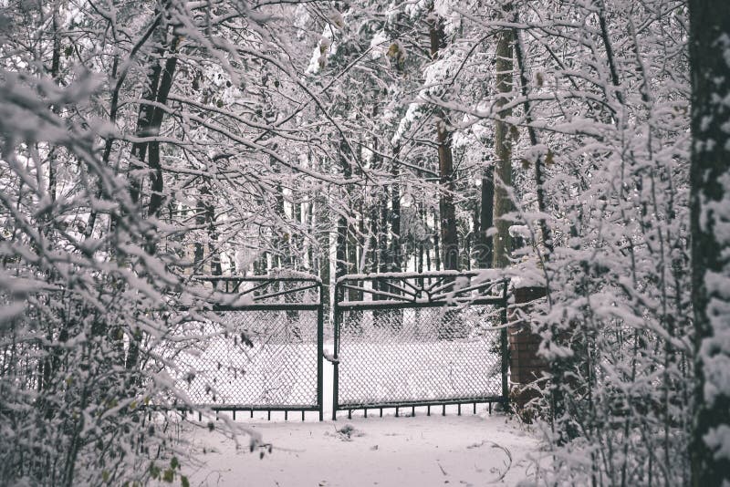 metal fence in winter - vintage film effect stock photography metal fence in winter - vintage film effect stock photography