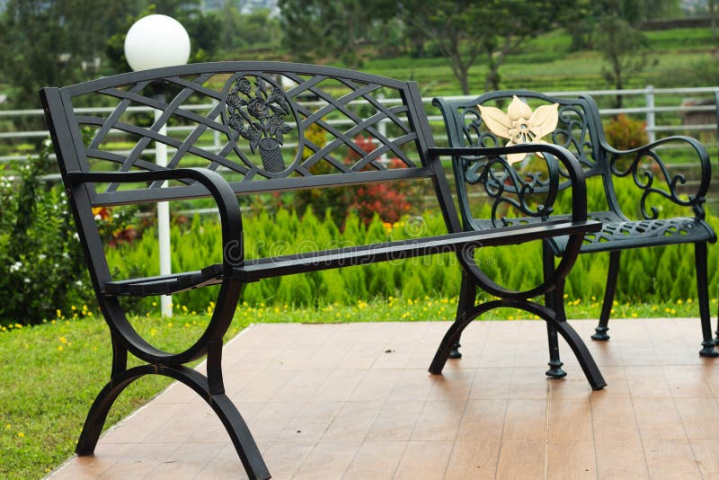 Metal garden bench stock photo. Image of decoration 268126874