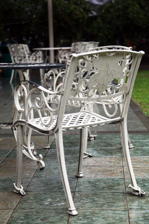 Metal garden furniture stock image. Image of outdoor, cobbles 2808993