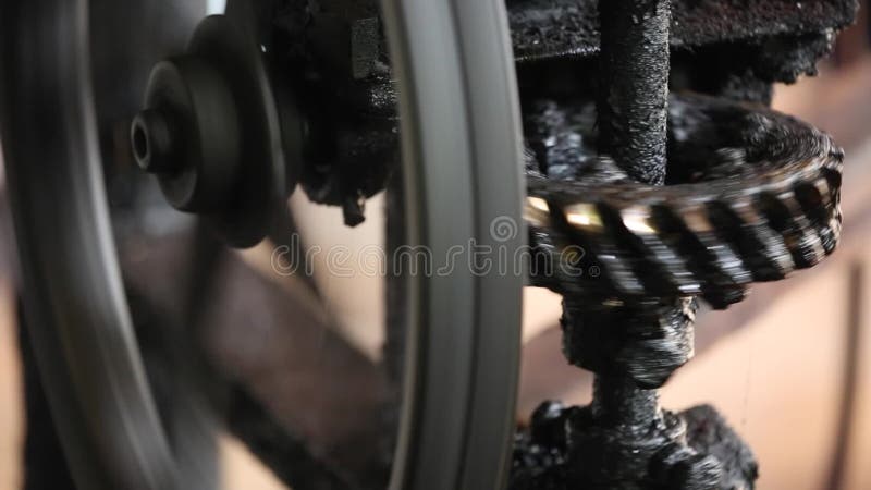 Metal gears turning machine industry stock footage