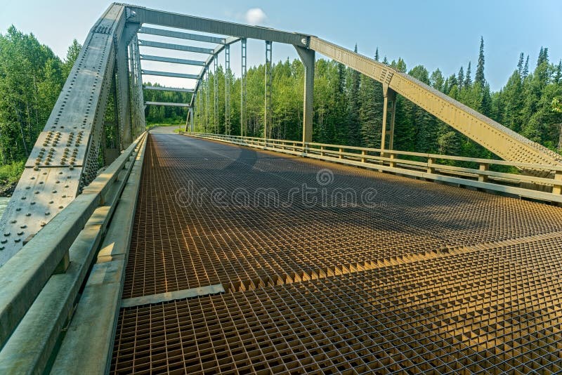 The metal grate surface of the Bell River Bridge 1 in British Columbia, Canada