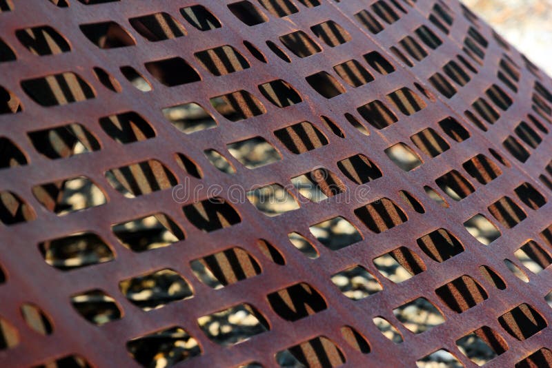 Metal grid as a waste trap system for filtering river water and blocking wastes stock image