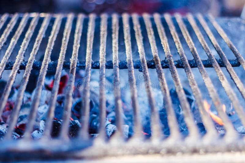 Metal Grill for Grilling on the Charcoal Grill in the Open Air. Stock