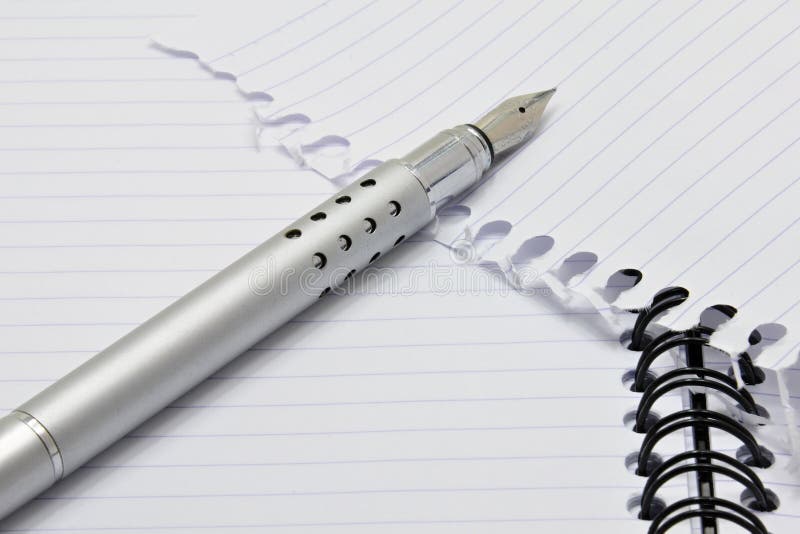 Metal ink pen and notepad stock photo. Image of information 29236294